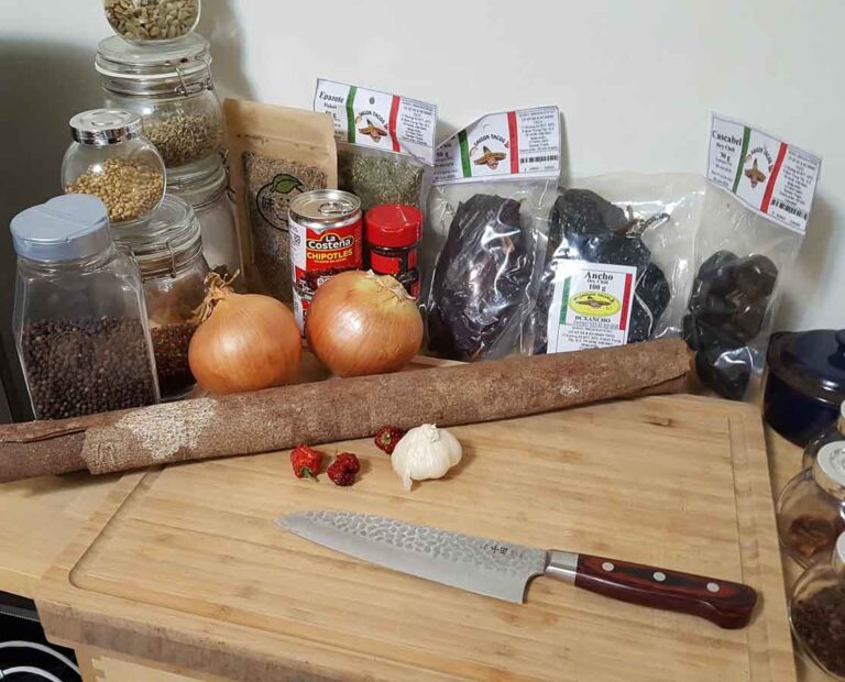 different chile and spices ready to make a great mole salsa