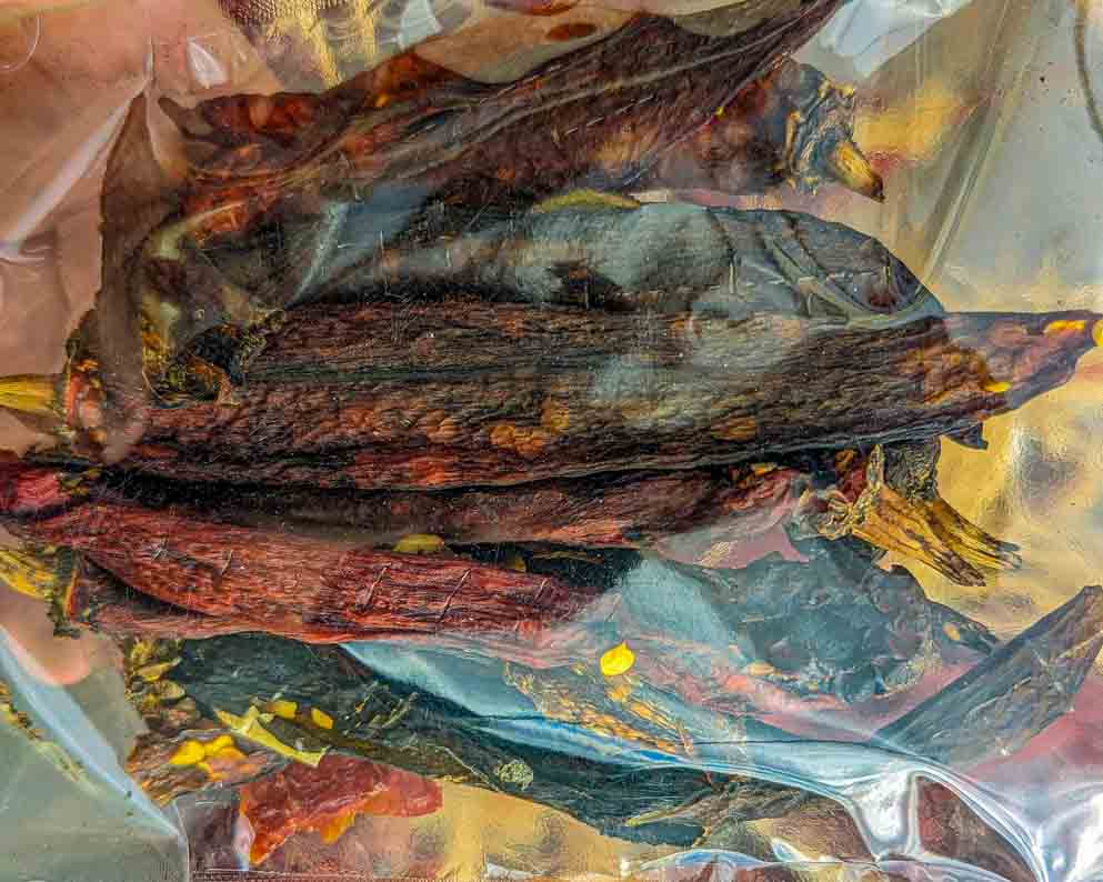 some dried roasted Hatch chile in a bag