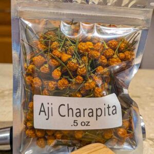 a half ounce bag of dried aji charapita peppers, the most expensive chili peppers in the world
