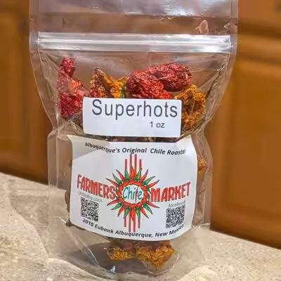a bag of various dried superhot chili peppers