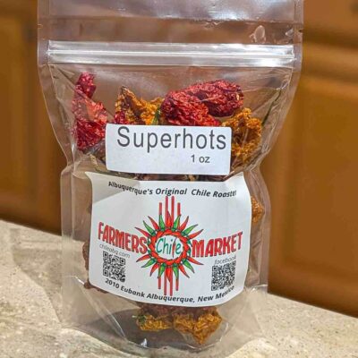 a bag of various dried superhot chili peppers