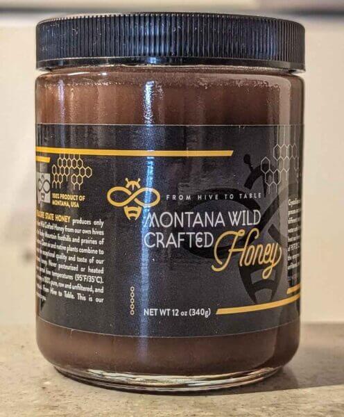 a 12 ounce jar of chokecherry raw Montana wild honey
