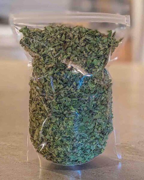 the backside of a large bag of Mexican oregano